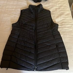 Womens 3/4 length sleeveless vest.
